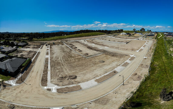 Aerial Shots Of A Developing Housing Estate In The Outer Suburbs Of Melbourne Australia, Roads And Gutters Have Been Built, Plots Of Land Some Already Sold Are Almost Ready For Houses To Be Built.