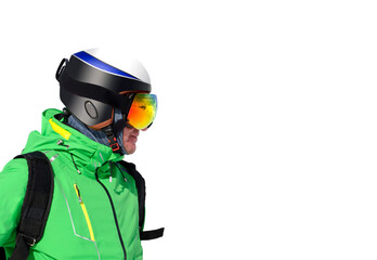 A male skier in profile. Man  the top looks into the distance