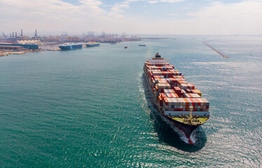 Container ship leaving the port,aerial view.