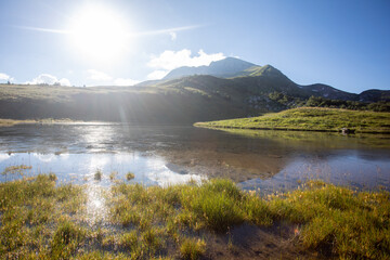 Obraz premium Mountain lake. Mountain peaks are reflected in the water