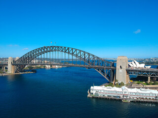 Obraz premium Panoramic Aerial views of Sydney Harbour with the bridge, CBD, North Sydney, Barangaroo, Lavender Bay and boats in view
