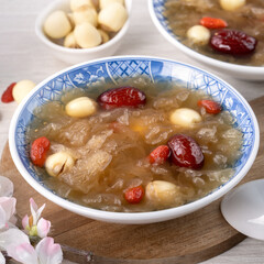 Close up of sweet snow white fungus soup with lotus seed, Chinese red dates and wolfberry.