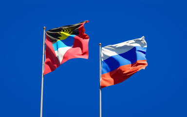 Beautiful national state flags of Russia and Antigua and Barbuda.