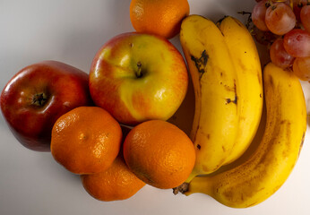 Fresh and healthy seasonal fruit, apple, grapes, banana, mondarin oranges.