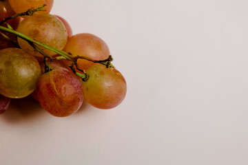 Fresh and healthy lucky grapes with space for text on white background