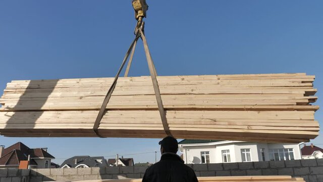 Shipment Wooden Boards for Construction Roof. Timber Joists for Building House