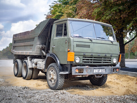 CHISINAU, MOLDOVA-AUGUST 30, 2019: 1976 Kamaz-55111 (first generation) dump truck at a construction site