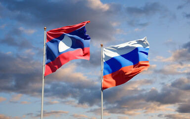 Beautiful national state flags of Laos and Russia.