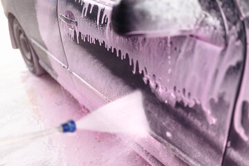 car wash using new purple foam.