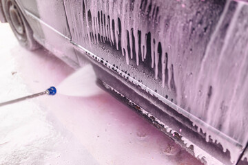 car wash using new purple foam.