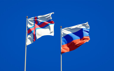 Beautiful national state flags of Faroe Islands and Russia.