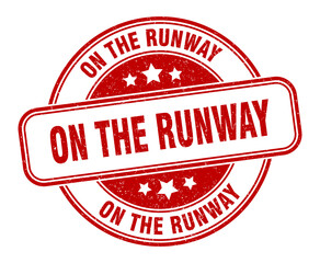 on the runway stamp. on the runway label. round grunge sign