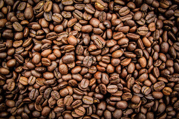 A roasted coffee beans texture background.