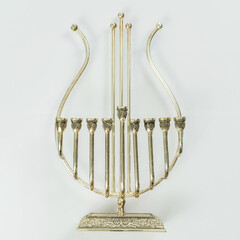 image of jewish holiday Hanukkah with menorah (traditional candelabra) isolated on white.