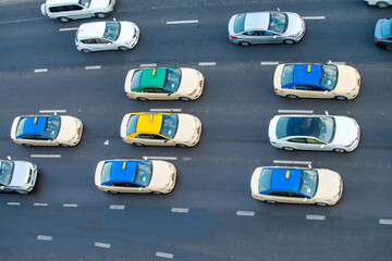 DUBAI, UAE - DECEMBER 9, 2016: Aerial view of colorful taxis along city streets