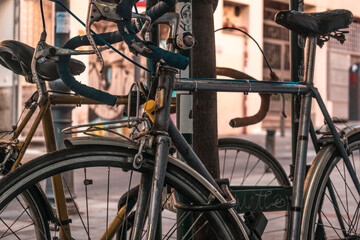 Fototapeta na wymiar Closeup of old bicycles in the streets of the popular Lavapies neighborhood in Madrid