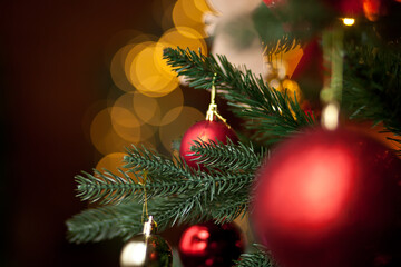 Decorated Christmas tree with bokeh on the background.