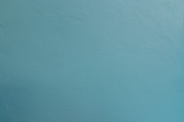 Cement wall with paint blue color for background and texture.
