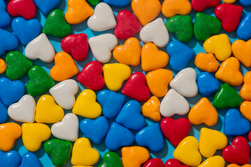 Background from small colored hearts Flat lay.