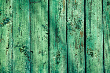 old wooden planks with a green background