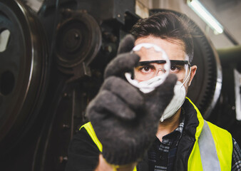 The quality checks of the manufactured metal part.