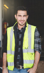 Portraits of caucasian engineer smile in a factory