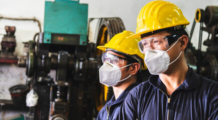 The industrial engineer working inside the factory