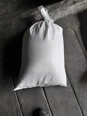 White hemp sack Packing chemical fertilizer, sugar, flour, rice waiting for delivery on Black...