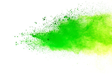 Freeze motion of green color powder exploding on white background.