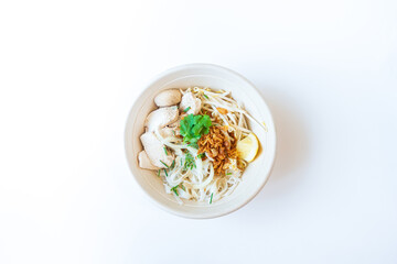 Delicious homemade Vietnamese soup Pho cooked with rice noodles, coriander leaves, soy sprouts, onions and chicken pieces for a complete and healthy meal