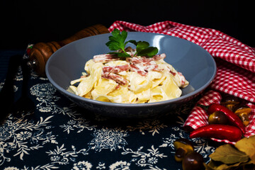 Tasty Carbonara pasta on the table