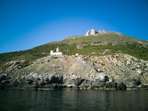 Rocky landscape of the little island of Marettimo in the Mediterranean  sea. Here also the little white lighthouse known as " Faro di Punta Libeccio"