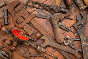 Vintage tools on a wooden background