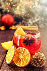 Spanish sangria, hot winter drink served at Christmas and New Year. Christmas colors and lights, party.