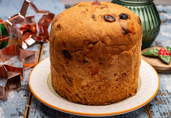 Christmas food, fresh Italian panettone cake made from yeast dough with dried fruits