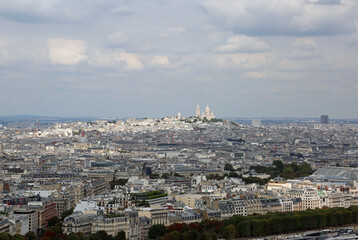 Fototapeta na wymiar View of Paris and the Church of MontMartre on the Hill seen from