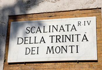 text in the famous steps of TRINITA DEI MONTI in ROME Italy