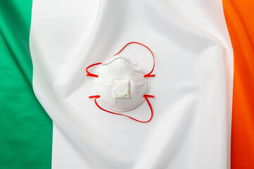 Medical face masks on flag of Ireland