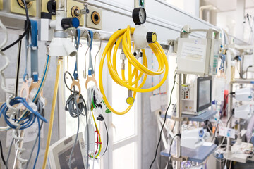 Medical equipment in ICU hospital emergency room,yellow pipe hose & healthcare equipment on...