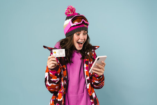 Cheerful Young Woman Wearing Winter Jacket Shopping