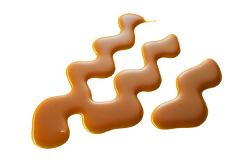 Wide squiggles of drizzled caramel sauce