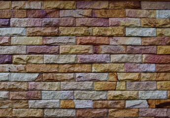 Closeup of Colorful Brick Concrete wall is a block texture background for design and decoration.