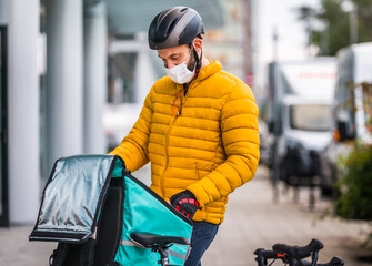 Food delivery, rider with bicycle delivering food