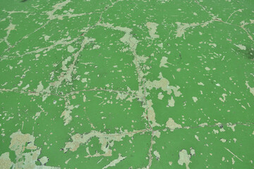 Colorful Floor volleyball, futsal, basketball, badminton outdoor court With water on the floor reflecting the building's shadow.