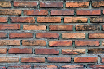 Cracked of Vintage Brick Concrete wall is a block texture background for design and decoration.