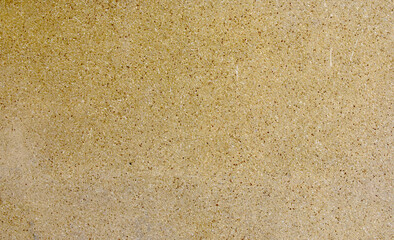 Golden cement wall for design and texture background.