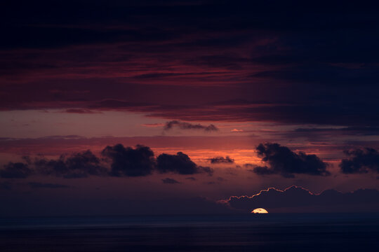 Colorful sunset over the ocean on Big Island of Hawaii