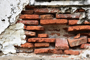 Cracked of Vintage Brick Concrete wall is a block texture background for design and decoration.