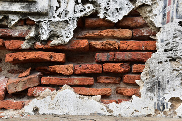Cracked of Vintage Brick Concrete wall is a block texture background for design and decoration.