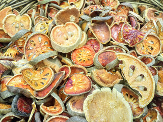 Dried bael is a herb and food in Asia.